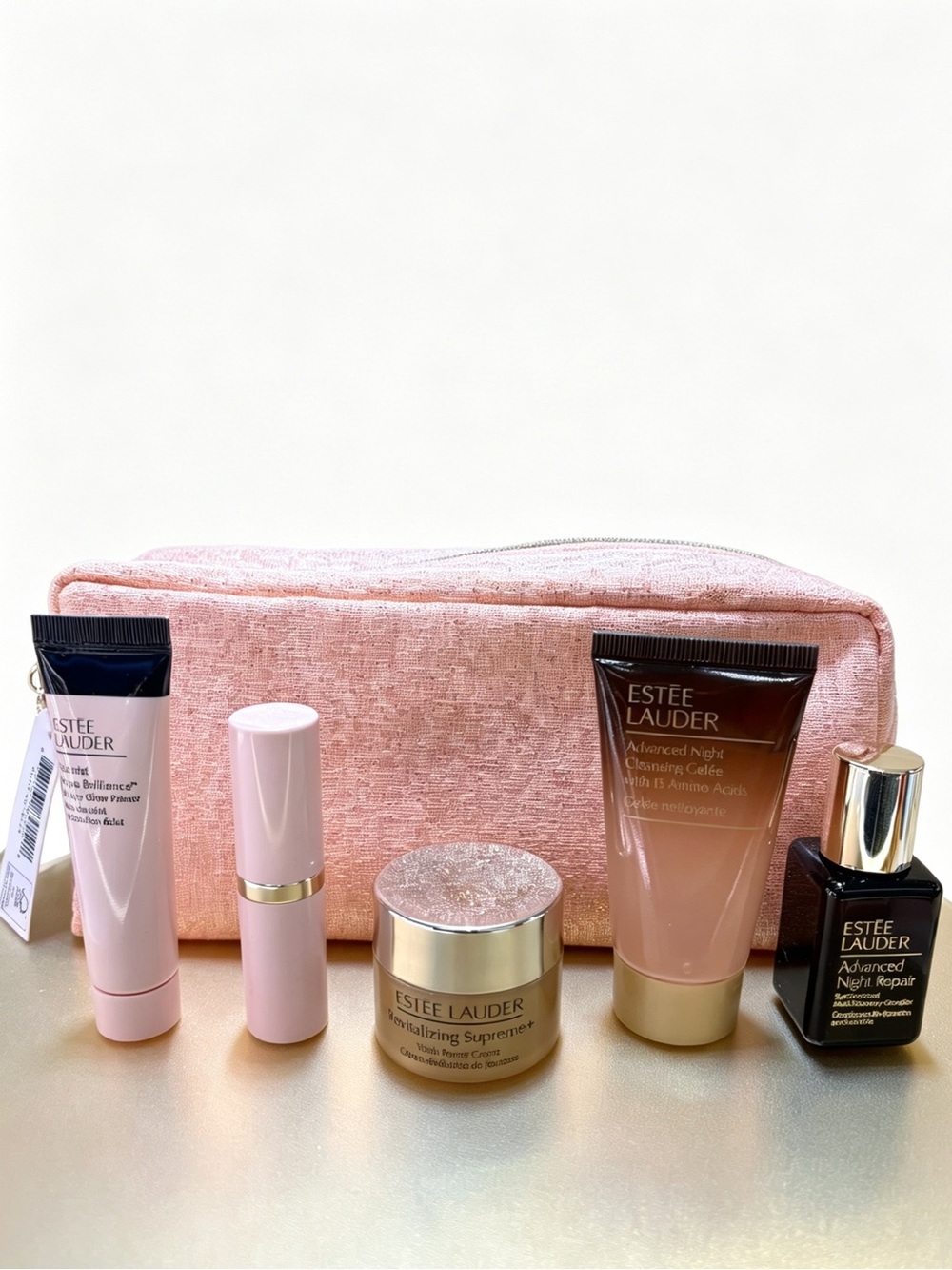 Estée Lauder Skincare & Makeup Set with Pink Glitter Cosmetic Bag